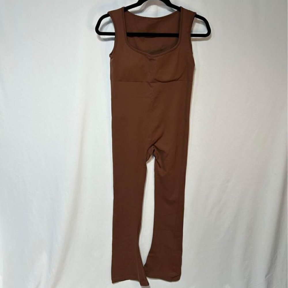 Woman’s one piece jumpsuit with flare bottoms. Gorgeous square neckline, padded